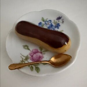 Floral Porcelain Plate with Gold Spoon and Chocolate Eclair